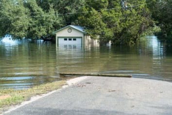 house flooded on a street