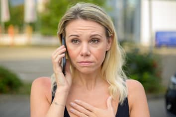 woman upset on phone
