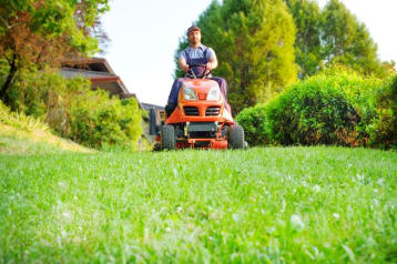 man mowing lawn