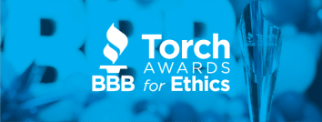 Text of BBB Torch Award for Ethics on a blue background of blurred letters BBB and the physical Torch award