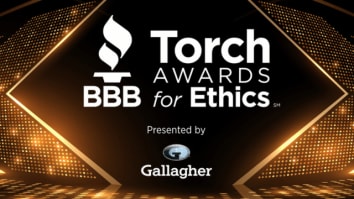 torch awards logo in front of golden lights with presenting sponsor logo
