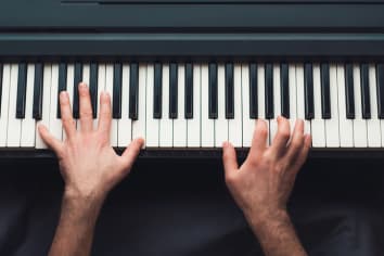 Man playing piano, top view