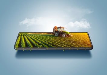 3d illustration of smart farming concept, tractor on a smartphone