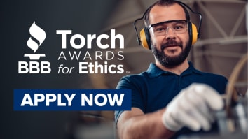Torch Awards for Ethics logo above words Apply Now with man working in a warehouse