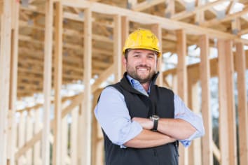 Worker wearing hardhat at construction site