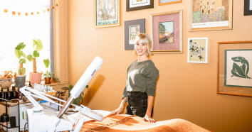 Founder of Sundara Skincare standing in her studio