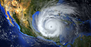 hurricane approaching the American continent visible above the Earth, a view from the satellite. Elements of this image furnished by NASA. 