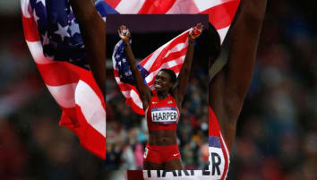 Olympic track and field runner Dawn Harper Nelson holds an American flag aloft as she celebrates a win.