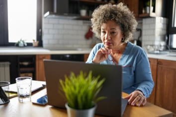 Person sitting by computer 