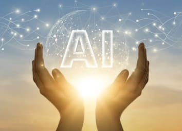hands in the sky encapping the sun with the word AI above the sun