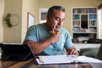 Man working from home using a computer