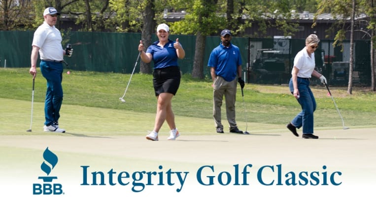 Golfers having fun on a golf course.