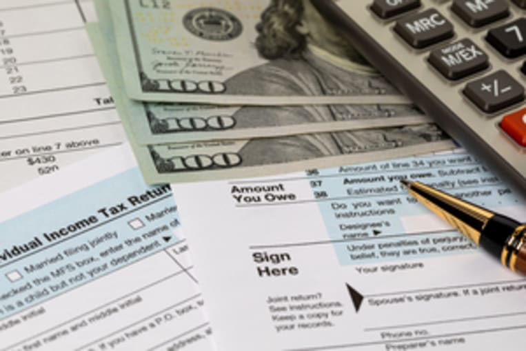 Federal tax return, income tax, tax refund and payment concept.