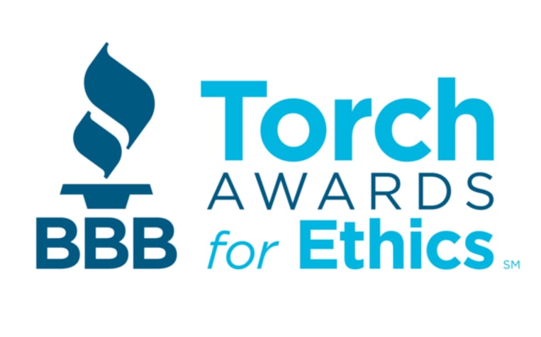 Torch Awards for Ethics Logo in different styles of blue