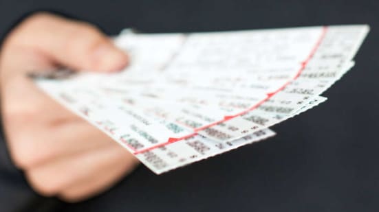 tickets in hand