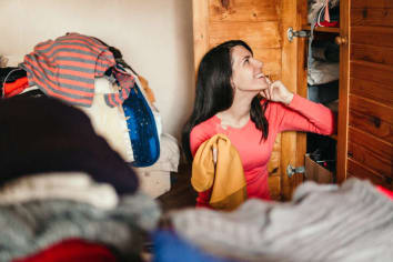 woman organizing closet