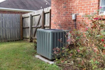 heating and air conditioning unit outside of home